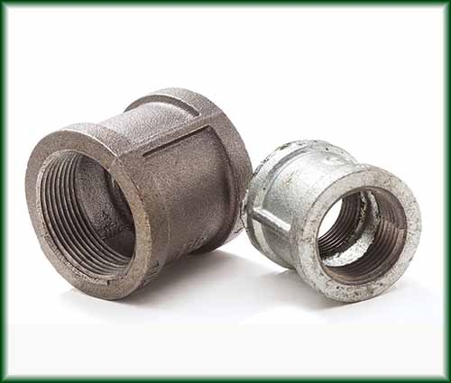 Two different Malleable Iron Couplings in black and galvanized finishes.