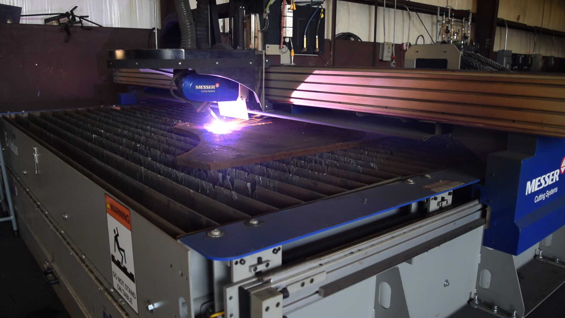 Plasma Table with head that makes Beveled Edges Steel Supply, L.P.