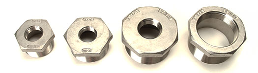Four different Cast Stainless Hex Bushings