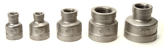 Five different Cast Stainless Threaded Reducers.