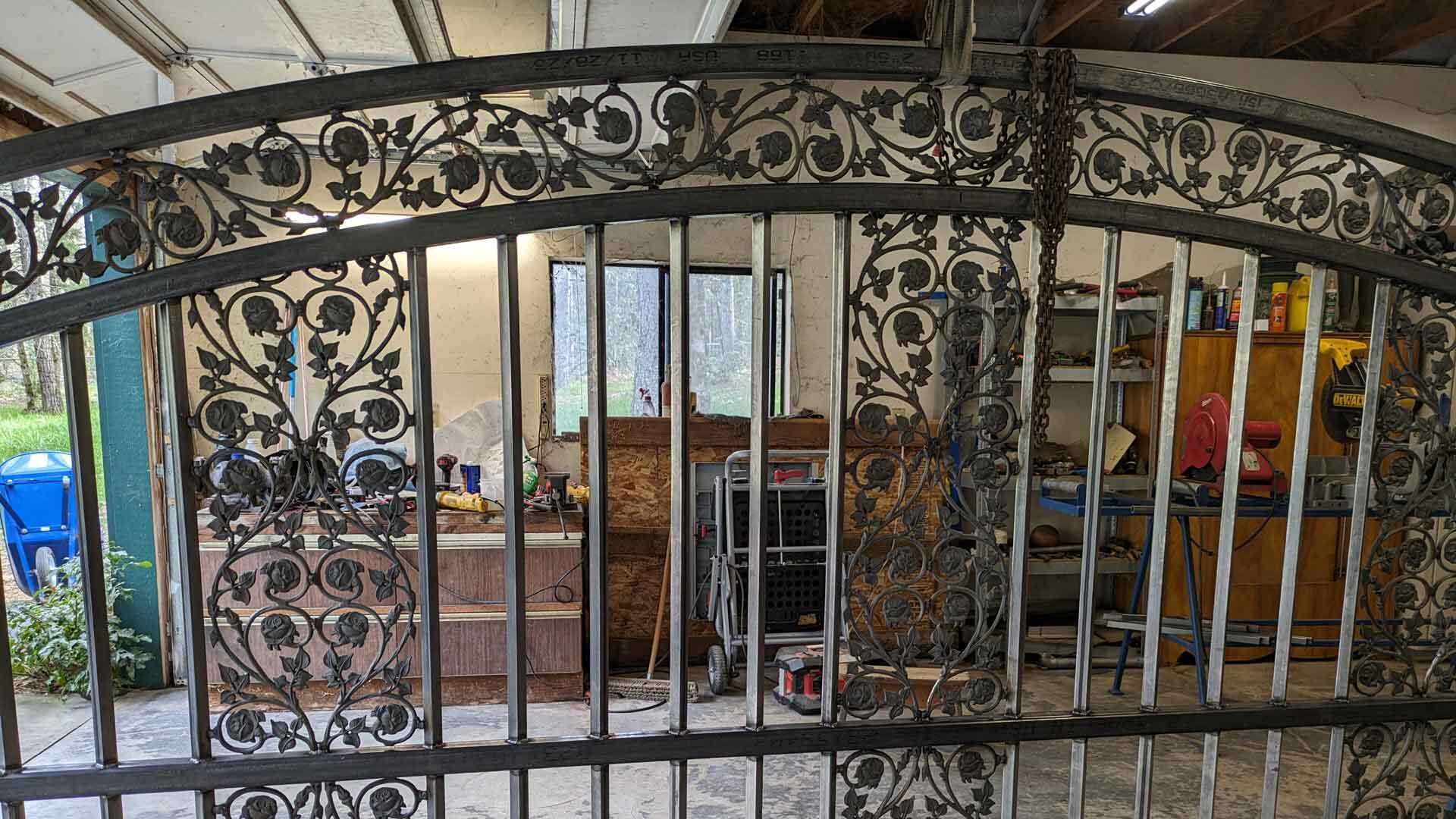 A Gate with Rose Ornamental Iron Panels
