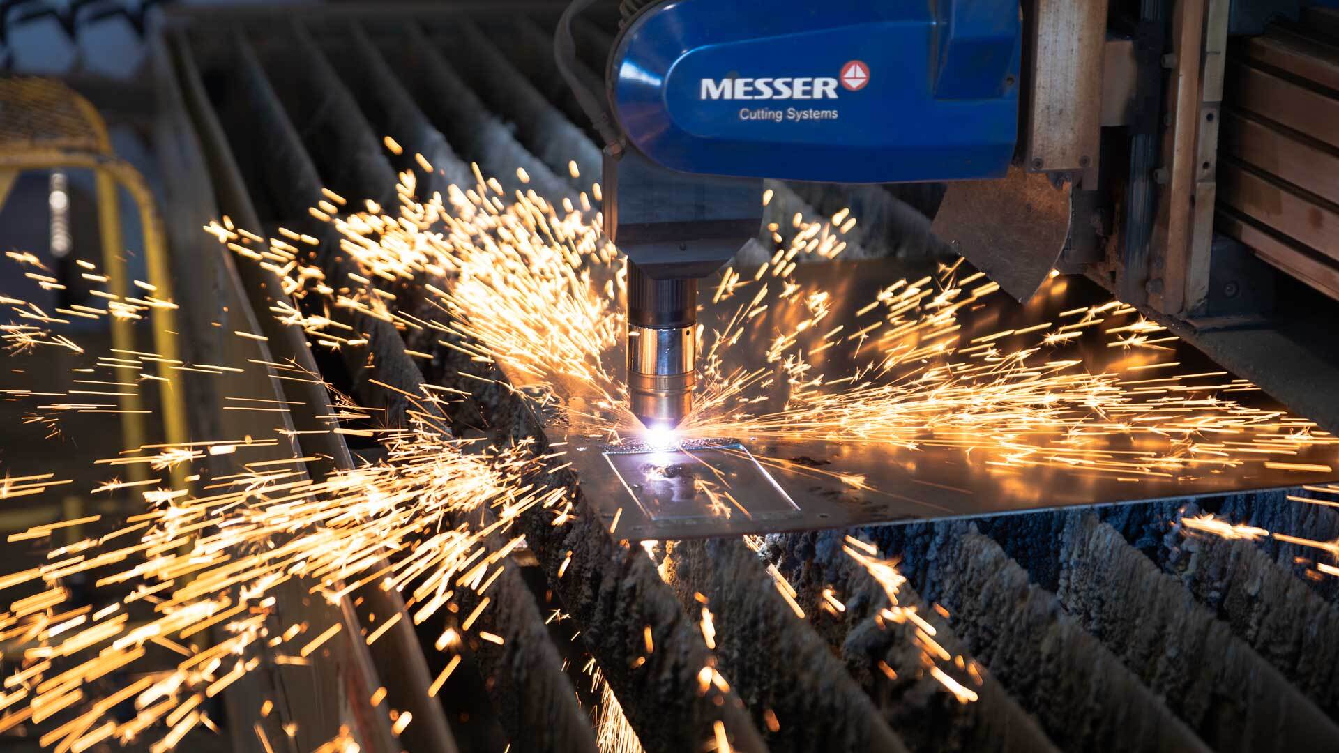 Etching attendees names onto a plasma-cut picture frame